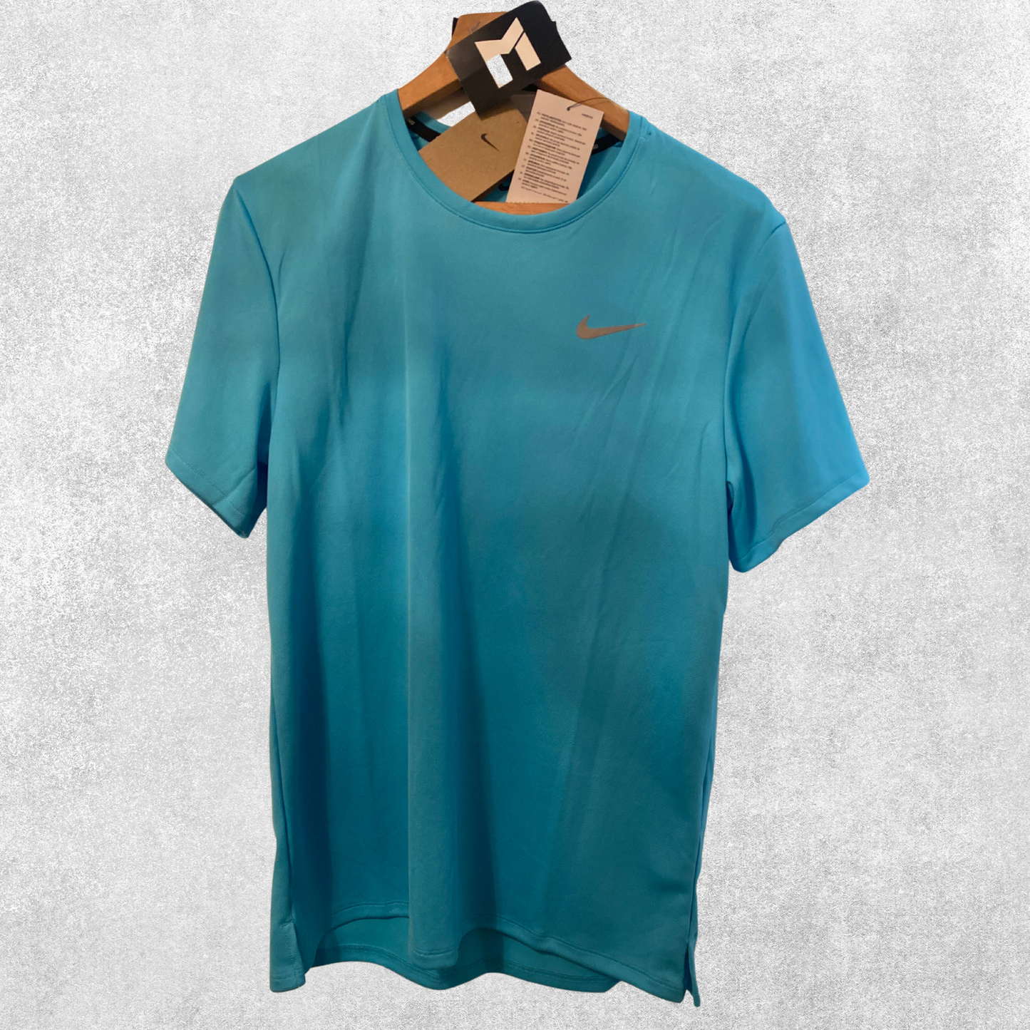 Nike - Teal Miler